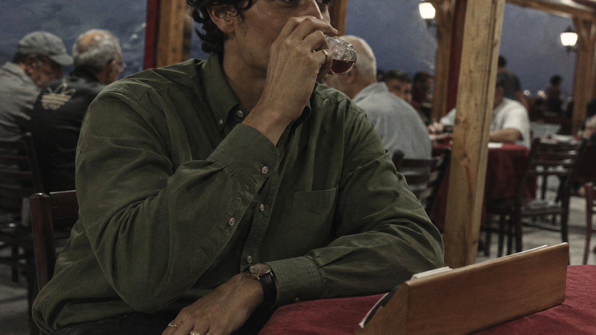 The Atticus 160 in Moss Green Oxford Cotton worn
