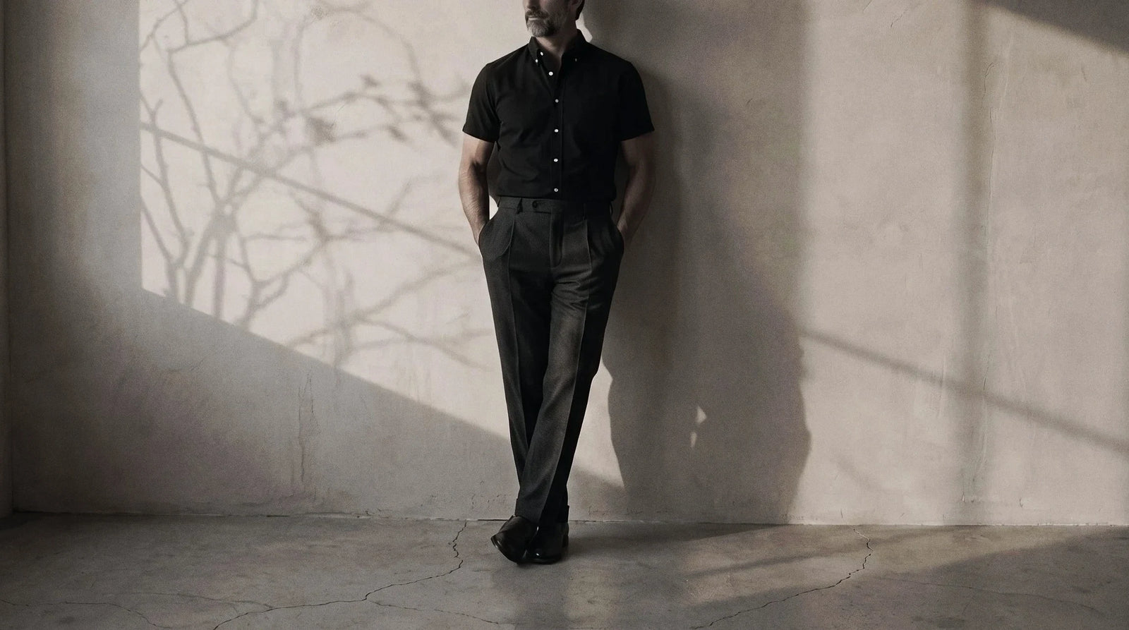 The Short Sleeve Atticus 160 in Onyx Pinpoint Oxford Cotton worn